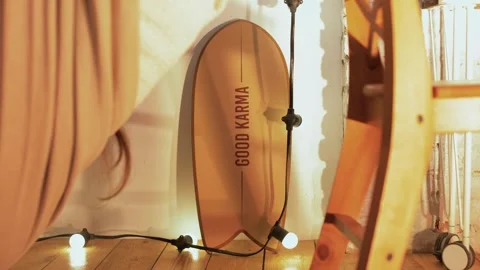 Short board for active surfing in the ocean stands against a wall inside Stock Footage 245991941