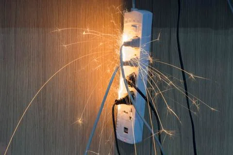 Short circuit causing sparking Caused by substandard electrical appliances Th Stock Photos