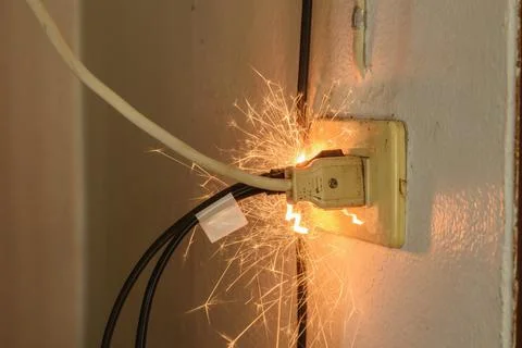 Short circuit causing sparking Caused by substandard electrical appliances Th Stock-Fotos