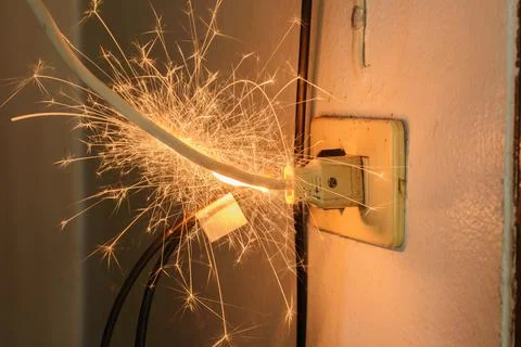 Short circuit causing sparking Caused by substandard electrical appliances Th Stock Photos