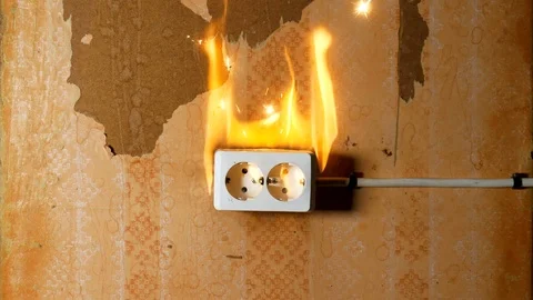 Short circuit. Fire in wall socke. Explosion! 動画素材 101811709