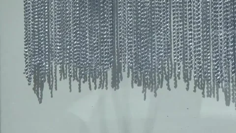 Short curtains of hanging chains Stock Footage 302651581
