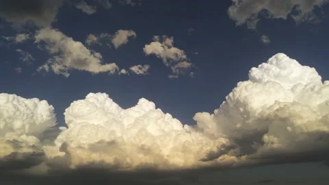 Short fast clouds moving - Drone camera moves right Stock Footage 134799378