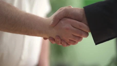 Short Firm Handshake of Different Working Classes: Businessman and Casual 動画素材 118548757