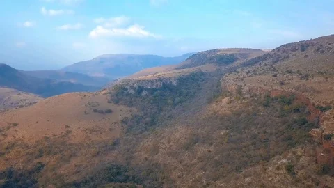 Short flight over rustic hilltops in Mpumalanga region of South Africa in the Stock Footage 78584516