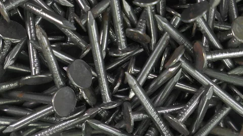 Short large heads nails on a turntable Video stock 63506233