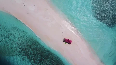 Short Line Of Beach And Sand Immersed In The Blue Water Of The Ocean Stock Footage 336499247