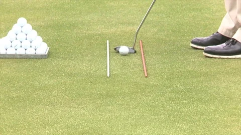 Short putt lips out while using golf alignment sticks 動画素材 80509213