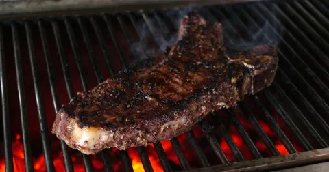 Short Rib cooking the grill Stock Footage 67450164