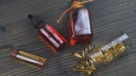 Short rotation Top view of Cannabis CBD THC products, oil and capsules Stock Footage 147164102
