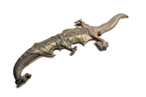 Short sword and the sheath executed in the form of a dragon on a white backgr Stock Photos