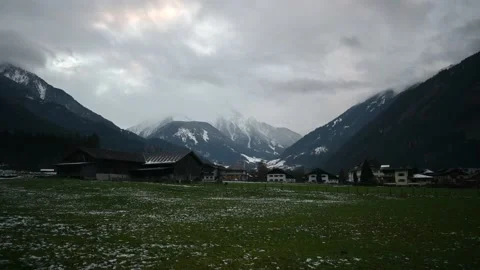 Short time lapse of a clouds over village in Austrian Alps Stock Footage 222400384