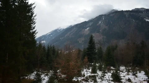 Short time lapse of a clouds over village in Austrian Alps Stock Footage 222400386