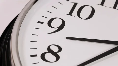 A short timelapse of a clock face focussed on the 9th hour mark Stock Footage 88487912