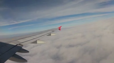 Short timelapse view from airplane window: fly through clouds Stock Footage 10872369