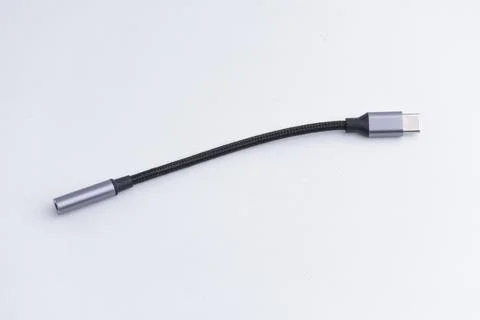 Short USB Type C to audio jack adapter cable isolated on white background Stock Photos