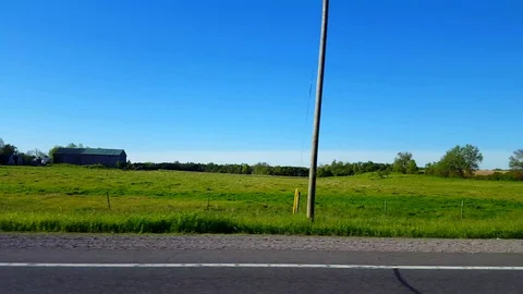 *Short Version* Side View Driving by Rural Farmland in Day. Stock Footage 115949234