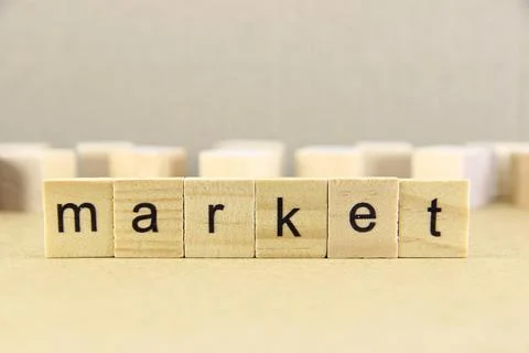Short word english letter with text "market" on a small wooden cubes block .. Stock Photos