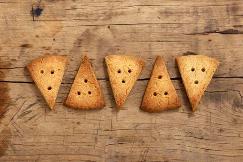 Shortbread biscuit on rustic wood background, flat lay Stock Photos