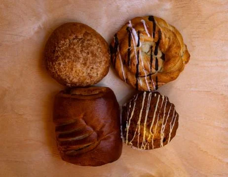 Shortbread cake, puff, bread roll and pastry cone Stock-Fotos