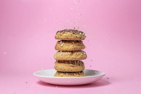 Shortbread cookies on a pink background. Shortbread cookies with sprinkles on a  Stock Photos