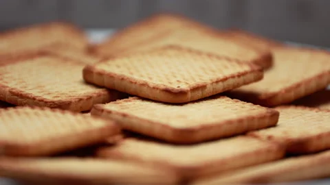 Shortbread Cookies From The Store Rotate On A White Platter On A Dark Background 스톡 동영상 150279378