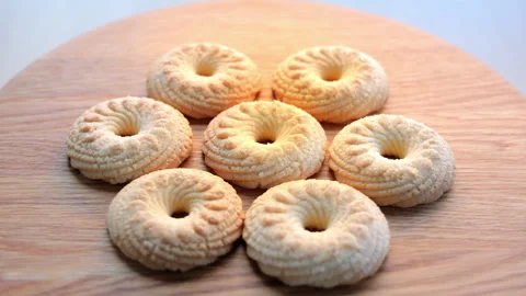 Shortbread rotating on a turntable. Confectionery, rotation. Stock Footage 244334688
