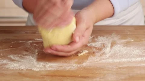 Shortcrust dough being shaped into a ball Stock Footage 24669663