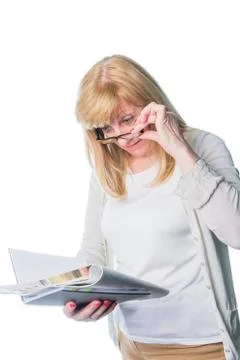 Shortsighted elderly lady Stock Photos