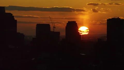 Shot on 4k RED camera on helicopter. Aerial view of silhouettes of buildings and Stock Footage 199460810