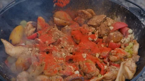 Shot of adding spices to a dish slow motion. Spices are added to the dish in the Stock Footage 279271797