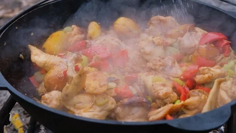 Shot of adding spices to a dish slow motion. Spices are added to the dish in the Stock Footage 282829682