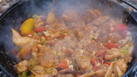 Shot of adding spices to a dish slow motion. Spices are added to the dish in the Stock Footage 282829825