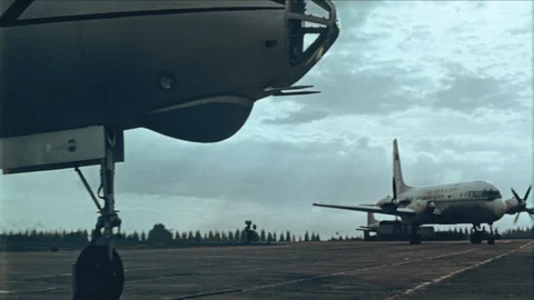 A shot of an airplane coming in for a landing in 1958. Vintage 35mm film Stock Footage