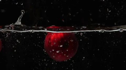 Shot of Apples Dropping in water Stock Footage 239016111