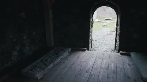 Shot of an archway door inside an old church ruin. Filmed within St Stock Footage 239511272