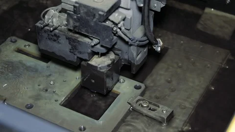 Shot of automatic cut sheet metal mechanism with liquid cooling and water splash Stock Footage 111368286