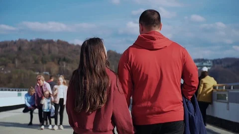 Shot back young couple of man and woman walking on street travel female action Stock Footage 121066469