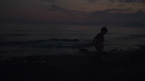 Shot of a beautiful summer sunset at the beach. Sunset at sea drone footage Stock Footage 88074789