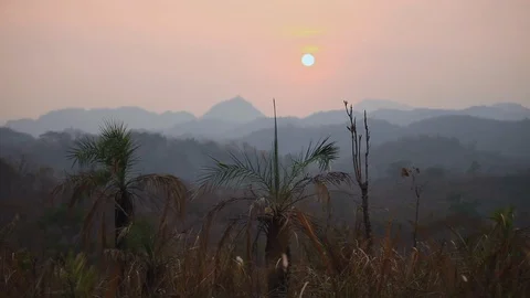 Shot of beautiful sunset, sun setting with beautiful sky Stock Footage 121860196