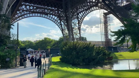 Shot from below of the first floor of the Eiffel Tower in Paris, France  Stock Footage 196151181