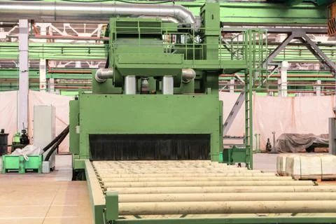 Shot blasting machine with roller table Stock Photos