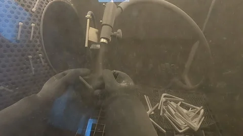 Shot blasting Shot blasting of model printed on 3D printer from polyamide powder Stock Footage 229995793
