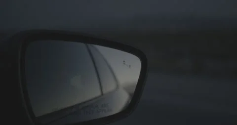 Shot of Blue Hour Sunset Through a Car Mirror Stock Footage 246510792