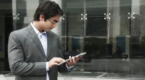 Shot of a businessman using a digital tablet Stock Footage 30073249