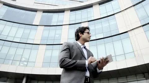 Shot of a businessman using a digital tablet Stock Footage 30073340