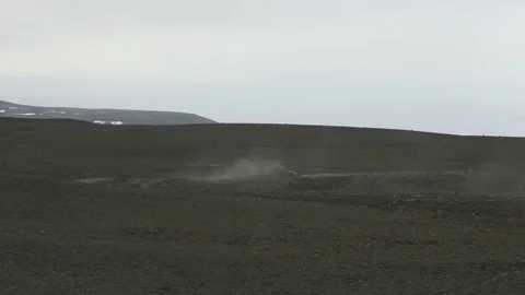 Shot of The Car Driving Through Huge Sandy Desert on ICELAND #12 Stock Footage 82374873
