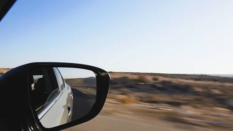 Shot from the car, reflected in the mirror. Stock Footage 105645157