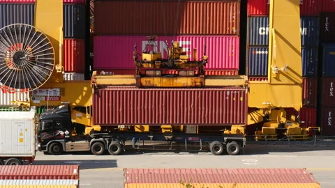 Shot of cargo container moving up at Sinhangman Port from truck 库存影片 163997704
