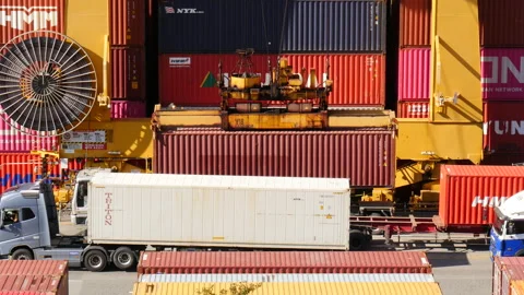 Shot of cargo container moving up at Sinhangman Port from truck Stock Footage 164009961